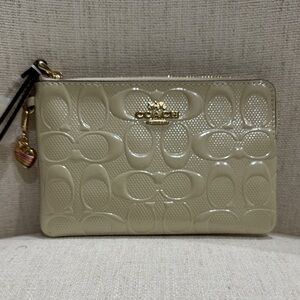 Coach Cream/ Light Beige Embossed Wristlet  NWT and Dust Bag